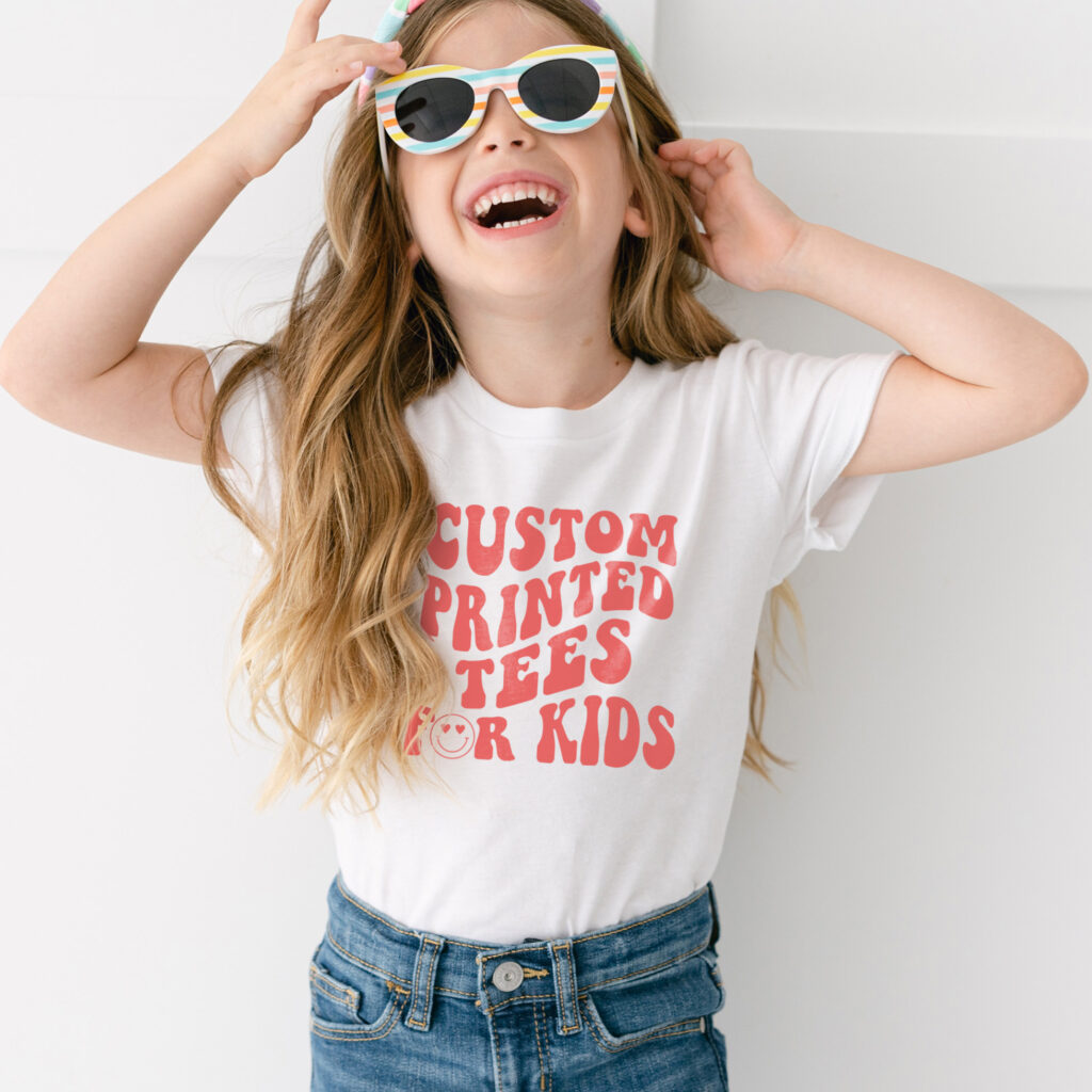 Happy girl wearing sunglasses and a white t-shirt.