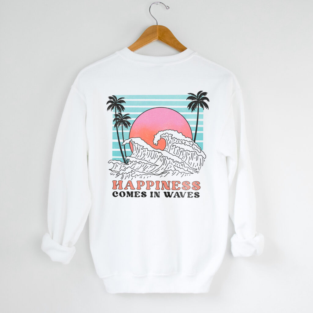 White sweatshirt with beach design on it.